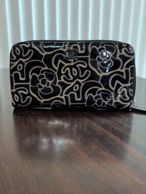 CHANEL Black Patent Camellia Outline Zip Around Wallet